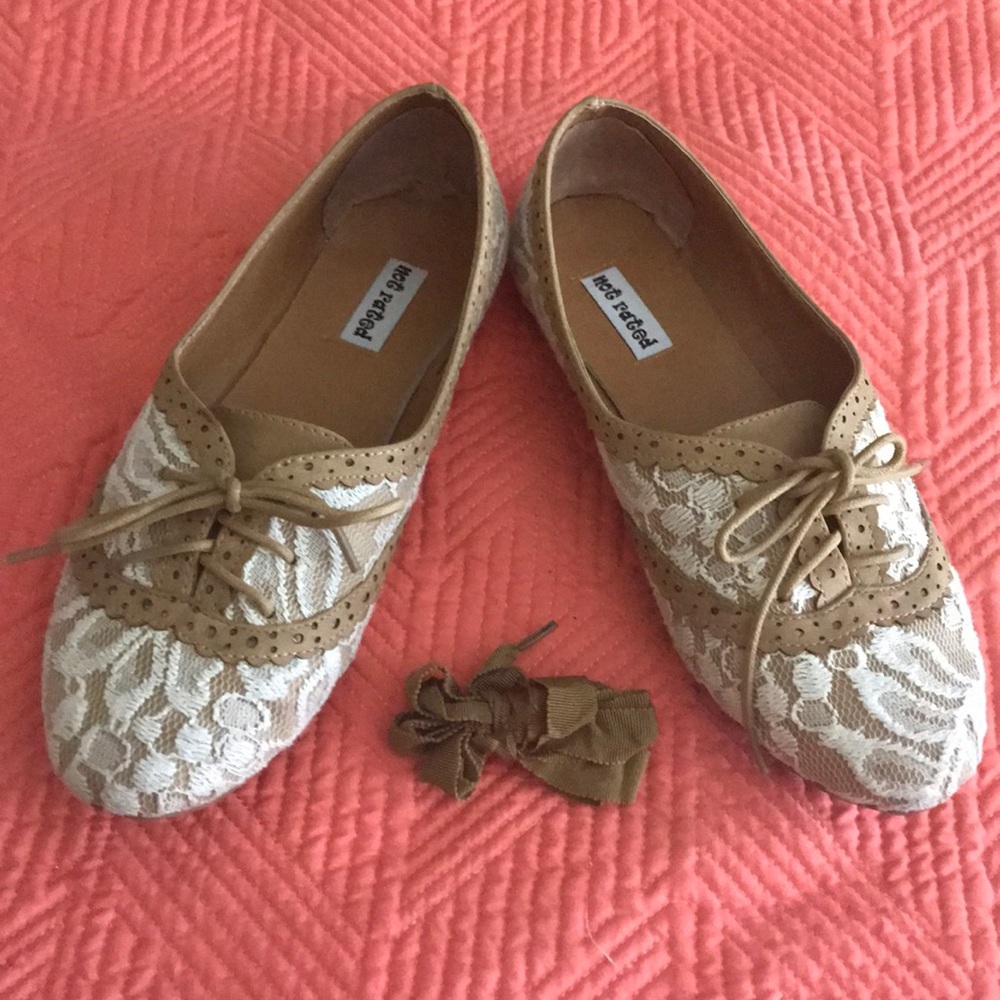 Tan and white shnazzy flats